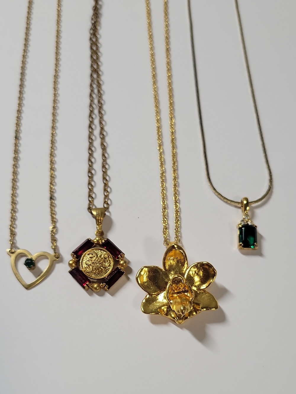 Gold Tone Orchid Pendant Necklace with Green and Emerald Accents